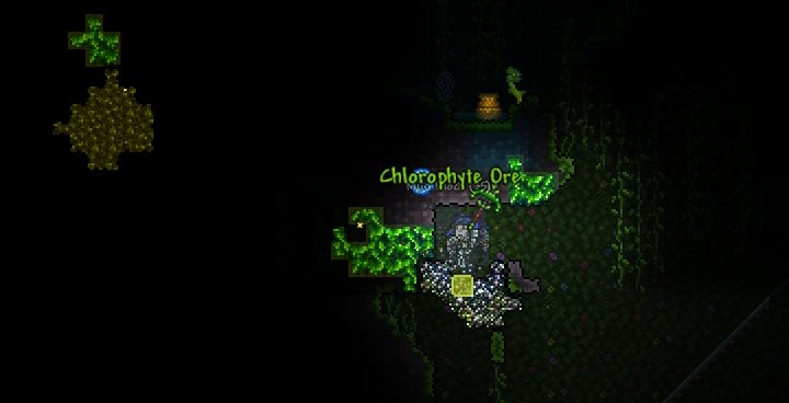 Mining Ore in Terraria - Chlorophyte and Titanium, to be exact.